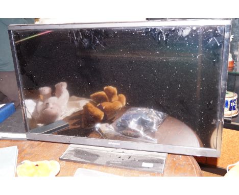 Polaroid 32" flat-screen T.V with remote