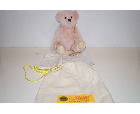 Steiff teddy bear with tags and original bag with swarovski crystal pendent and gloves