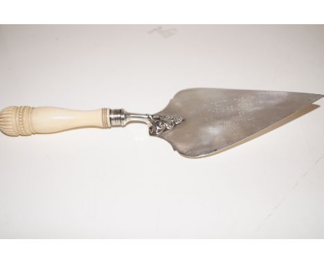 silver presentation trowel with ivory handle, full hallmarked. inscribed 'presented to the church by the directors of P.B.W M