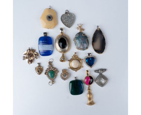 A curated collection of 15 vintage pendants featuring a diverse array of gemstones, metals, and intricate designs. This assor