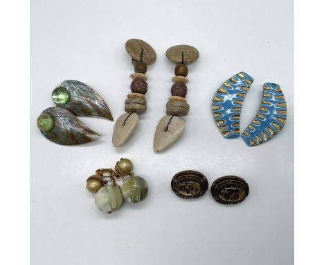 Natural material designs of clip back earrings in stone, shell including enamel and faux stones. Largest piece: 4.25"L x 1.25
