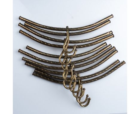 Elegant set of 10 vintage brass hangers featuring a distinctive twisted rope design. These decorative hangers showcase a grac