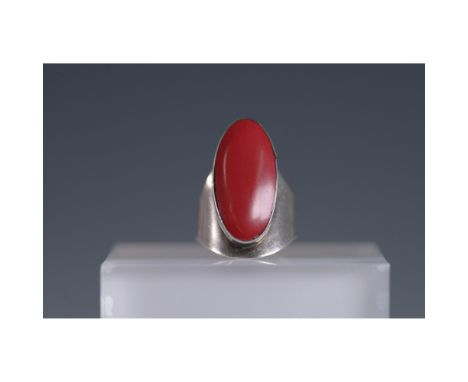 Vintage Mexico 925 sterling silver ring featuring a bold, oval-shaped red or dark pink stone, as showcased in the provided im