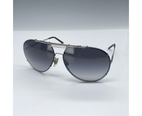 A unisex aviator style with a pilot shape and full rim frame. They have a silver frame with a gold hinge, silver arms, and bl