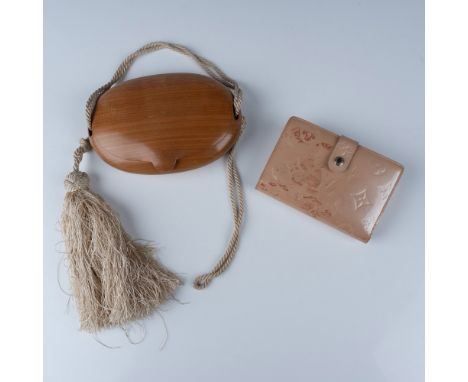 This unique vintage auction lot features two luxury accessories, Fendi Wooden Tassel Clutch Bag, crafted from smooth, polishe