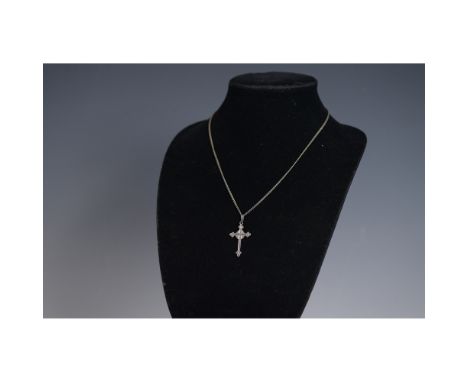 This lot features a sterling silver cross pendant adorned with marcasite stones, showcasing intricate craftsmanship. The pend
