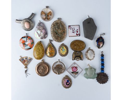 A unique assortment of 20 vintage pendants and charms, showcasing a diverse mix of materials, designs, and cultural influence