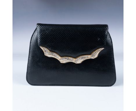 A stunning vintage Judith Leiber evening bag crafted from black textured leather, showcasing an elegant gold-tone and crystal