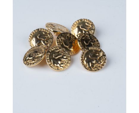 A stunning set of eight authentic Chanel gold-toned buttons, each measuring approximately 0.75" in diameter. These vintage bu