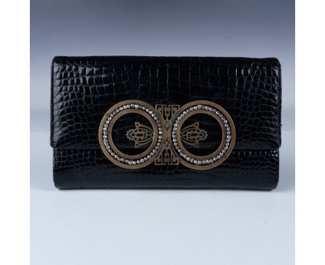 A stunning vintage crocodile-embossed leather evening clutch by Morabito Paris. Renowned for their exceptional craftsmanship 