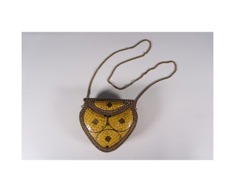 A unique vintage evening bag featuring an intricate mosaic inlay design in vibrant yellow with geometric patterns, framed by 