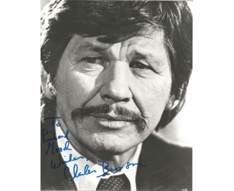 Charles Bronson signed 10 x 8 inch b/w early portrait photo, to Richard. Good condition. All autographs come with a Certifica