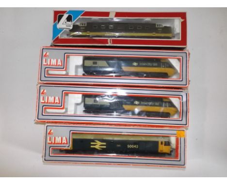 Lima:- Intercity locomotive and dummy, together with two other diesel locomotives, boxes damaged, lacquered.