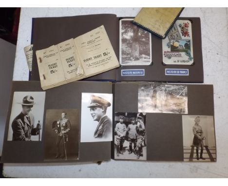 A scrapbook relating to Edward VIII including a photograph with Japanese officers, a small postcard album and a part used Pin