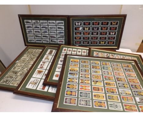 Seven sets of cigarrette cards, each framed and glazed both sides:- G. Phillips, British butterflies (25), Lampert and Butler
