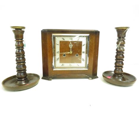 Art deco mantle clock together with a pair of candle sticks 