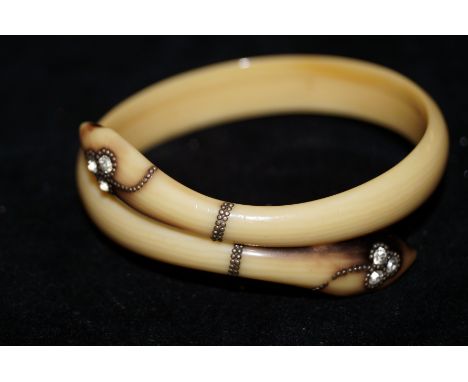 Old snake bangle with 3 white stone on each head