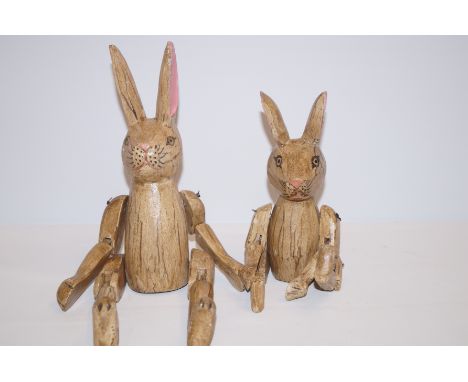 Two wooden shelf rabbits