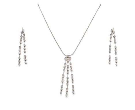 A Diamond Drop Pendant on 18 Carat White Gold Chain and A Pair of 18 Carat White Gold Drop Earrings, en suite, the round bril