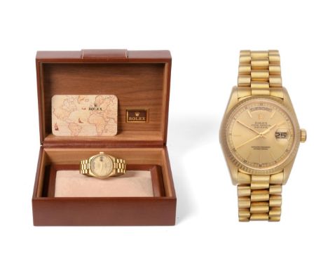 ^ An 18ct Gold Automatic Day/Date Centre Seconds Wristwatch, signed Rolex, Oyster Perpetual, Superlative Chronometer Official