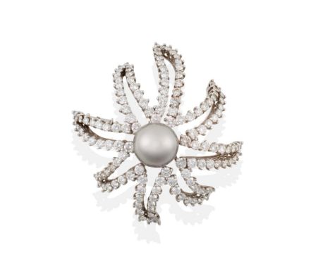 ^ A Cultured Pearl and Diamond 'Fireworks' Brooch, by Tiffany, a grey cultured pearl within a round brilliant cut diamond set