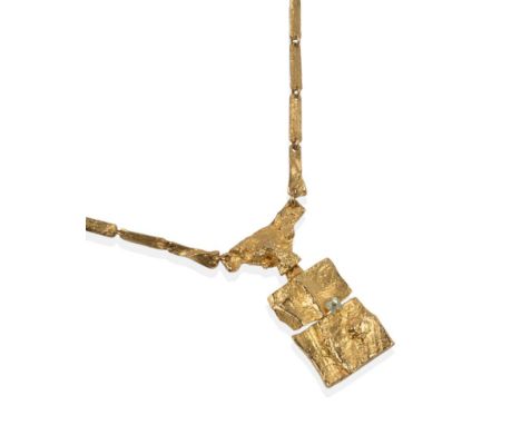An 18 Carat Gold Necklace, by Lapponia, the abstract form with a textured finish, a blue bi-pyramid gem inset to the pendant,