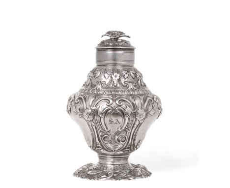 ^ An Early George III Silver Tea Caddy, Samuel Taylor, London 1761, ogee form, decorated with C scroll and floral panels, the