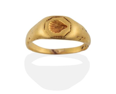 A Medieval Gold Pilgrim Finger Ring, 15th-16th Century, the head engraved with a scallop shell within an octagonal bead borde