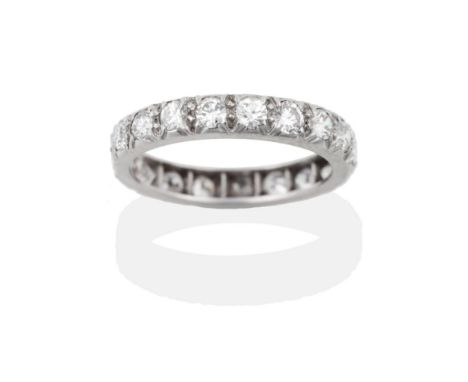 A Diamond Eternity Ring, the round brilliant cut diamonds in white claws, total estimated diamond weight 1.10 carat approxima