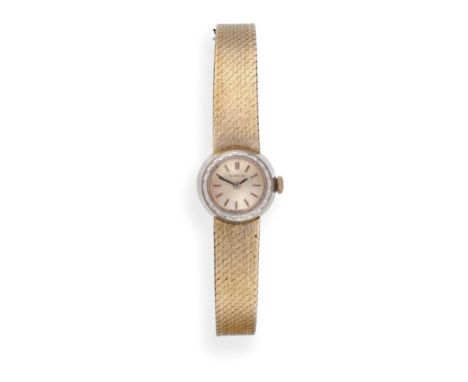^ A Lady's 18ct White Gold Wristwatch, signed Gubelin, circa 1970, (calibre A1003), lever movement signed, silvered dial with