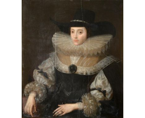 Attributed to Marcus Gerards (Gheeraerts) the Younger (c.1561-1636) Flemish  Portrait of a lady, half length seated, wearing 