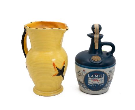 Lamb's Navy Rum flagon with contents, H20cm; and Burleigh ware jug, the handle in the form of a Chinese cloud dragon, H19.5cm