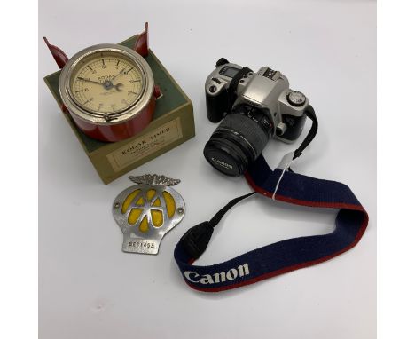 Canon EOS 500N camera, with Canon 58mm lens; vintage boxed Kodak Timer; A vintage AA car badge. (3)