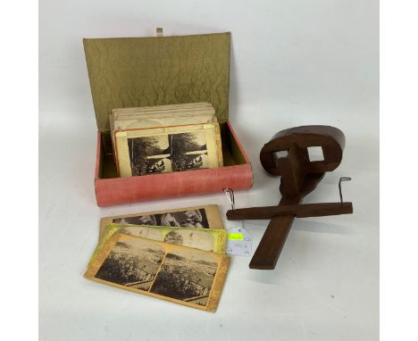 Stereoscope and cards, c1900. Hand-held walnut stereoscope, quantity of cards including US landscape.