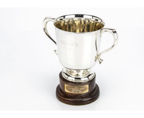 A George V silver twin handled trophy cup by William Hutton &amp; Sons, dented to base, with later engraved horse's name of A