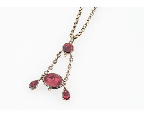 A 19th Century foil backed gem set and seed pearl drop pendant, on an oval linked chain, 29cm together, 9.5g