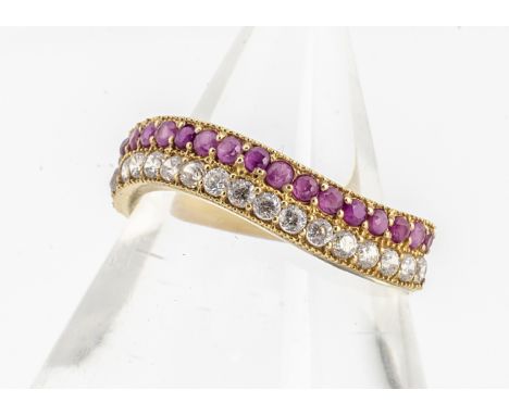 A continental yellow metal ruby and white sapphire dress ring, marked 875 to inner shank, ring size R