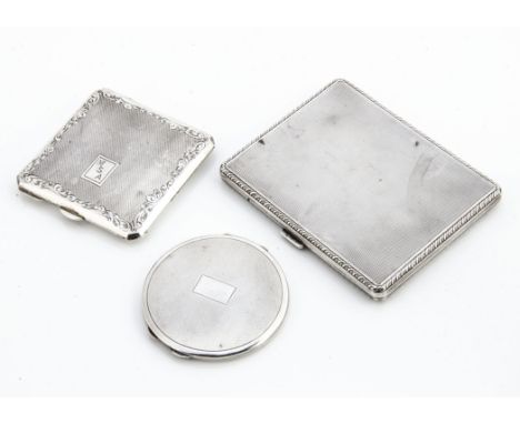 An Art Deco George V silver cigarette case, engine turned and stylised gadrooned border, London 1930 and two 1950s silver com