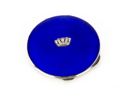 A 1940s silver and enamelled compact, blue enamel to cover with Naval crest, 7.5 cm, appears in good condition