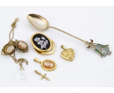 An early 20th Century continental silver and plique a jour enamel coffee spoon, together with a pair of cameo earrings and a 