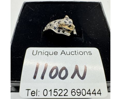 A 9ct gold leopard ring. Size P, 2.22 grams