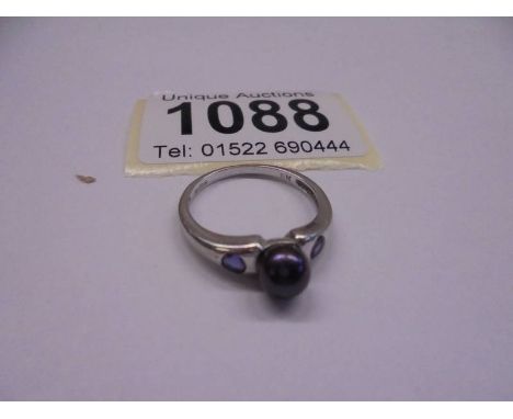 A 9ct white gold stone set ring, size N half, 2.46 grams.