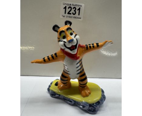 A Wade Kelloggs Tony The Tiger SurfinThere is no damage, Height 11.5cm, no boxes or certificates.