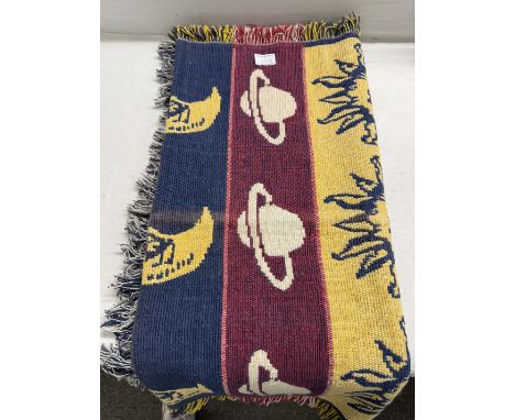 A wool tapestry wall hanging of planets