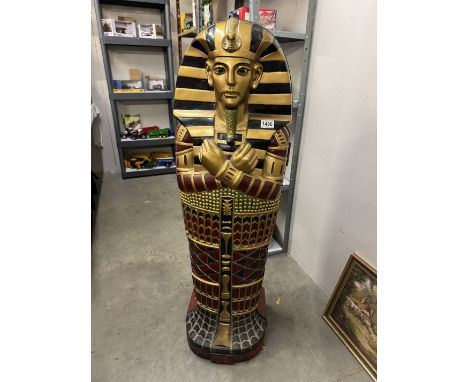 A decorative Egyptian revival DVD/CD cabinet in the form of a Pharoah.