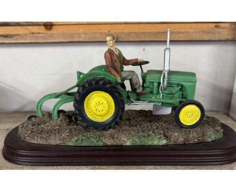 A Leonardo Collection Ferguson tractor.