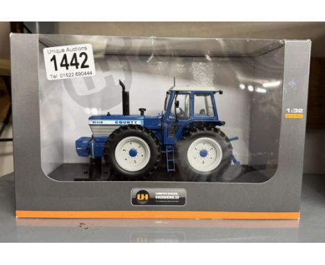 A Universal Hobbies 1/32 1425 Ford County tractor.