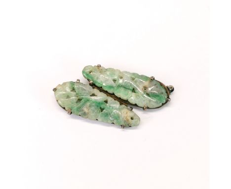 A pair of antique Chinese carved jade items mounted as a brooch, c.1920s. L. 4cm.
