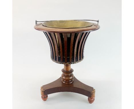 A Dutch inlaid mahogany planter with brass lining, H. 48cm. Dia. 36cm.