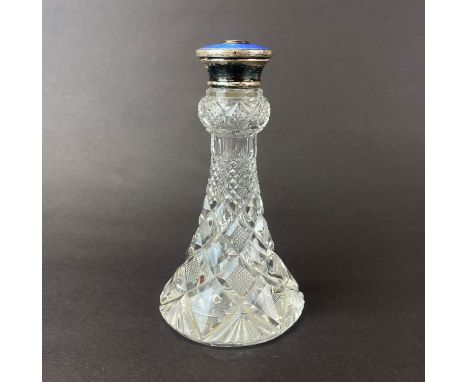 A sterling silver and enamel topped cut glass perfume bottle, H. 14cm.